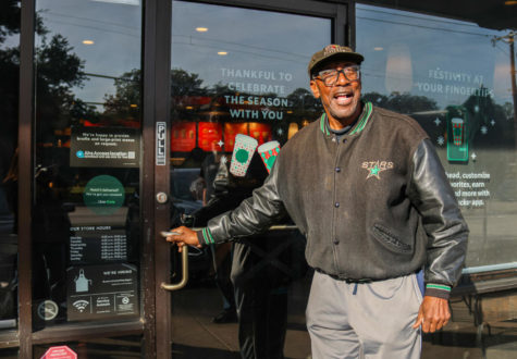 Radio personality Dewayne Dancer welcomes guests to Starbucks on Nov. 18 in Arlington. Dancer has built relationships with customers through his acts of kindness.