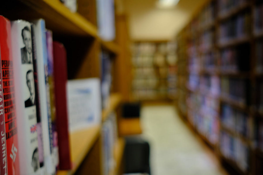 Shelves at the Sims Library in Waxahachie, Texas, reveal a history book wearing a swastika on its sleeve.