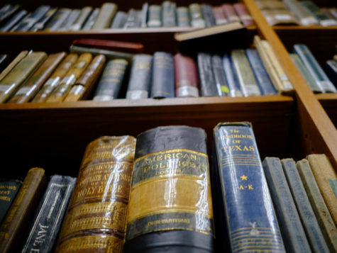 Antique books gather dust in the basement of Sims Library in Waxahachie, Texas, on Oct. 18.