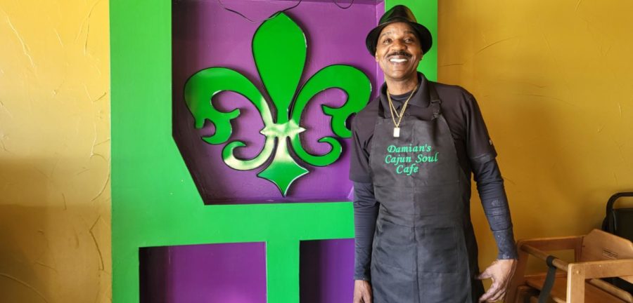 The taste and smell of authentic Cajun food can be found at Damian's Cajun Soul Cafe in Arlington, Texas. Damian Placide, the owner and chef, is pictured here inside his restaurant.