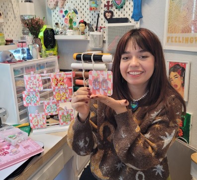 Monarca owner Fatima Ceja with one of her jewelry creations.