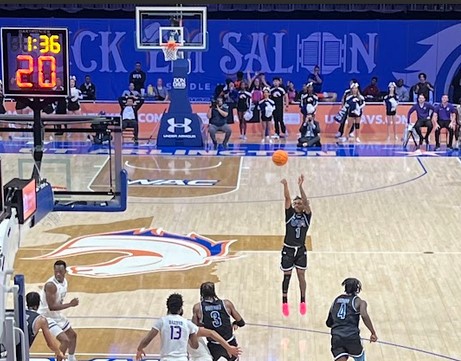 Mavericks guard Phillip Russell launches a three-point attempt against Tarleton State on Feb. 15 at College Park Center.