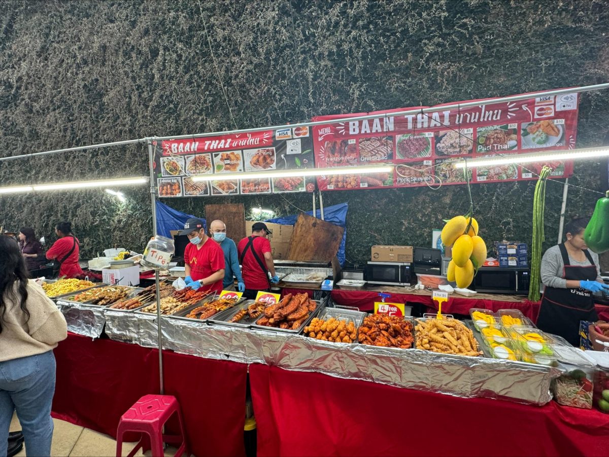 Food vendors fill the air with mouth-watering scents at the Lunar New Year celebration at Asia Times Square.