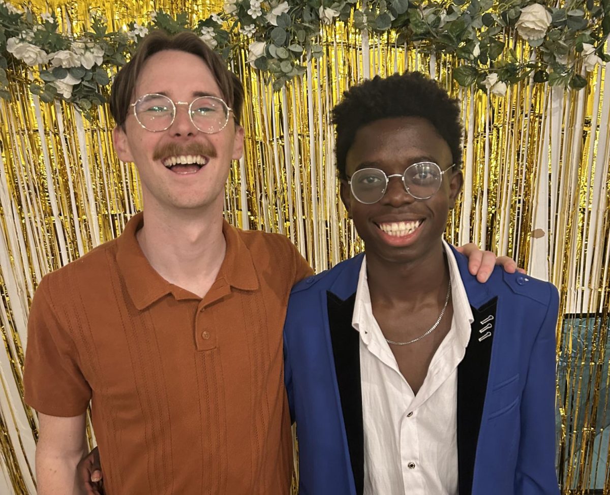 Graham Spencer, left, poses with Vincent Ajala. Spencer met Ajala, a student from Nigeria, in his role as campus pastor for Fellowship of Christian University Students at the University of Texas at Arlington.