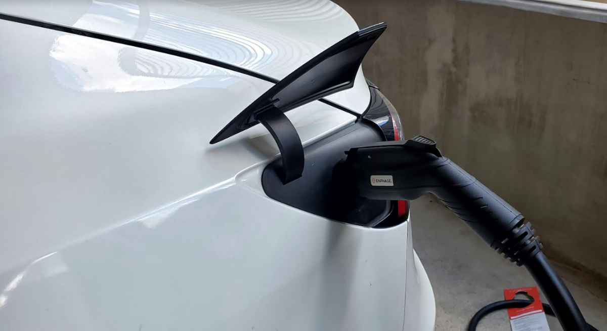 To help Texas transition transportation infrastructure to accommodate electric vehicles, the state secured a $100 million federal to bolster EV charging capacity. In this photo, an EV is hooked to a charger.