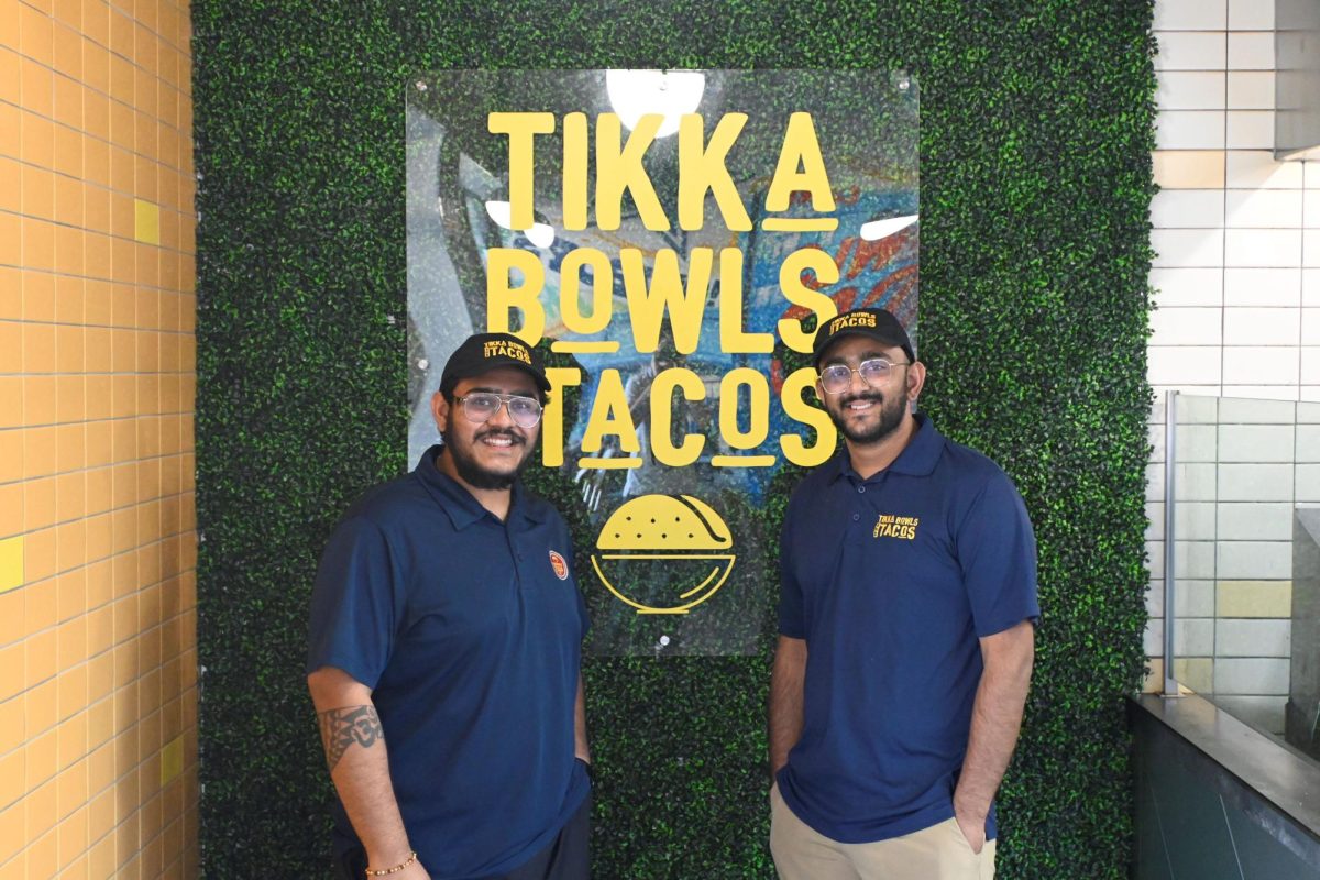 Neel Patel, left, and Kartik Patel launched Tikka Bowls and Tacos with an eye toward running a business. But after finding unexpected support from the area's Muslim community, the Patel brothers said they treat each customer as family.