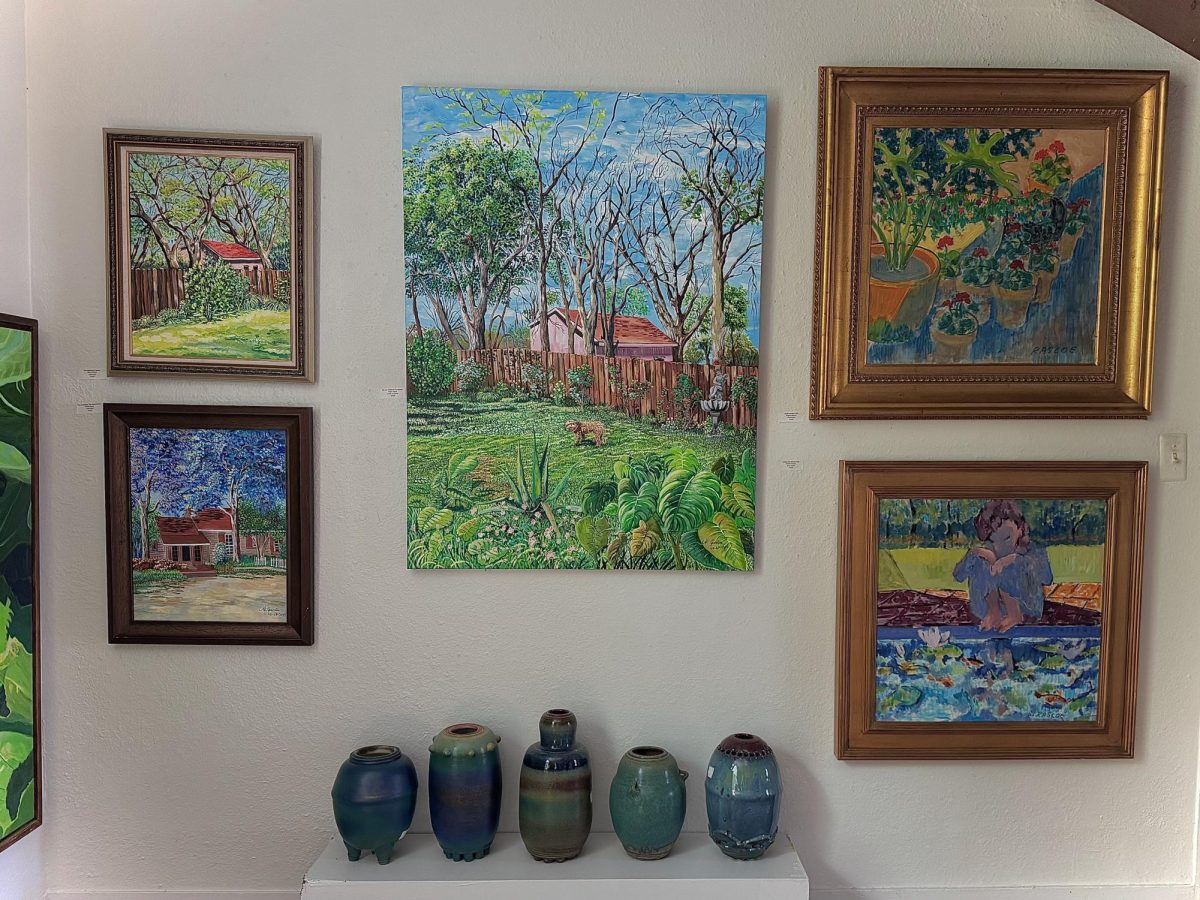 The walls are awash in color at The Upstairs Gallery in Arlington, Texas.