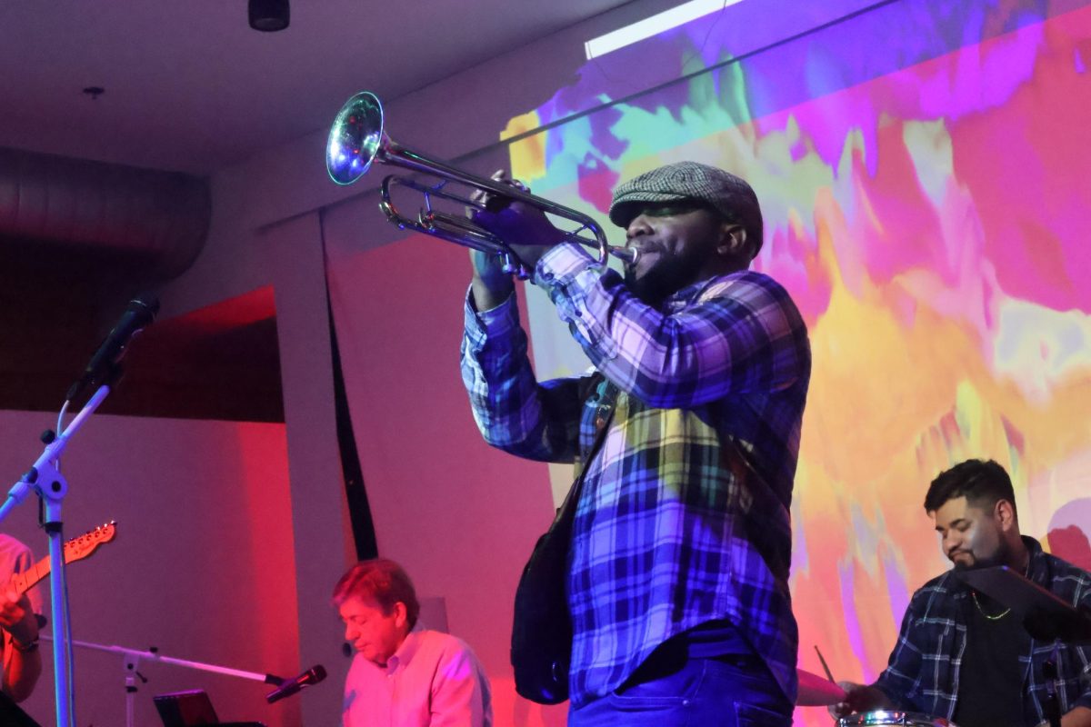 Gabriel Parker, music business major at the University of Texas at Arlington and social media manager for Truth Vinyl, plays his trumpet during Truth Vinyl's Jazz Jam event on Feb. 10, 2026.