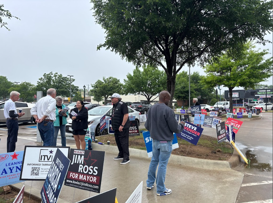 Candidates for Arlington office answer questions from voters outside the Tarrant County Sub-Courthouse on Abram Street.