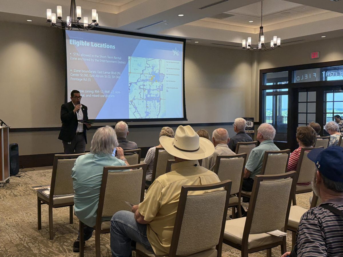 Gus Garcia, the city of Arlington's economic development director and code compliance, gives an update to the community on plans to mitigate the impacts of short-term rentals to neighborhoods during the FIFA World Cup.